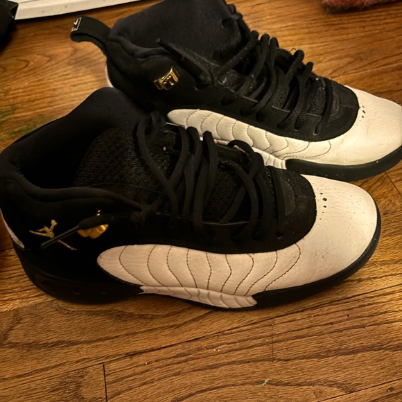 black white and gold jordans jumpman